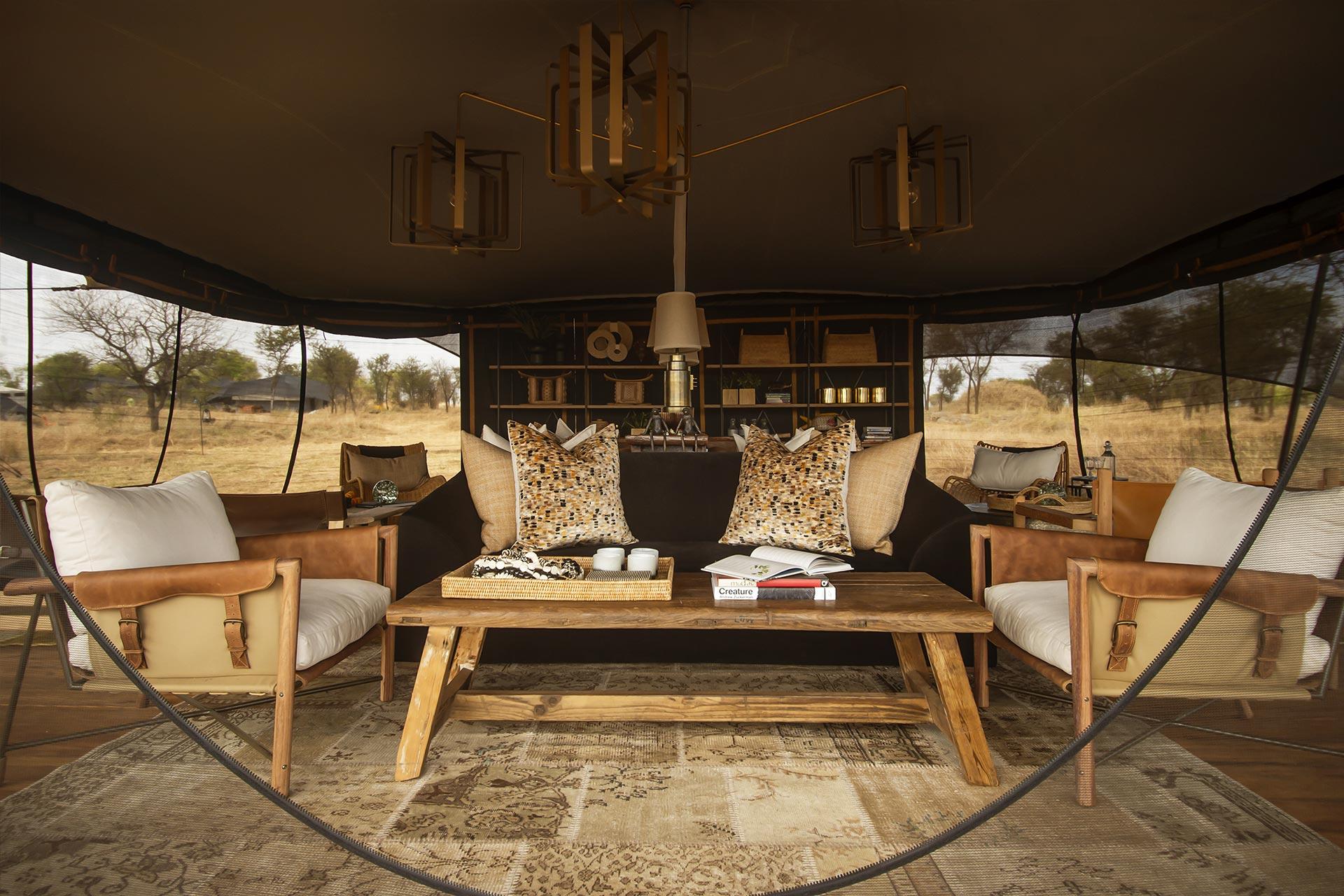 The new Dining and Lounge tent of the Siringit Migration Camp The Siringit Migration Camp has been made in Tanzania using locally sourced and recycled materials. The stretched canvas panels have been cut, handstitched and custom-designed to bring you closer to nature